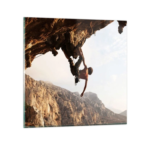 Quadro su vetro - Il mondo ristretto in una mano sul bordo del masso - 70x70 cm