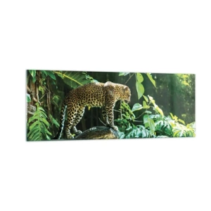 Quadro su vetro - Un leopardo in piedi su una roccia circondato da vegetazione tropicale - 140x50cm - A caccia? - Decorazione murale moderna per soggiorno e camera da letto ARTTOR