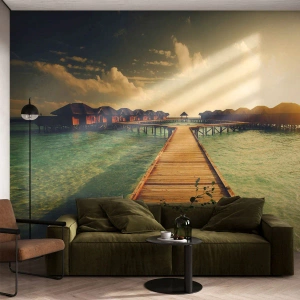 Fotomurali Premium Sand - Molo tropicale che conduce ai bungalow sull'acqua - 100x70cm - Caldo invito - Decorazione murale moderna per soggiorno e camera da letto ARTTOR