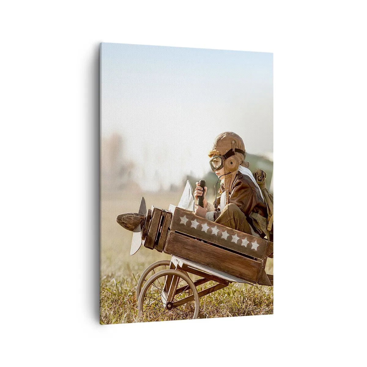 Quadro su tela - Stampe su Tela - Un bambino su un aeroplanino giocattolo con un campo sullo sfondo - 70x100cm - Decollo verso i sogni - Decorazione murale moderna per soggiorno e camera da letto ARTTOR