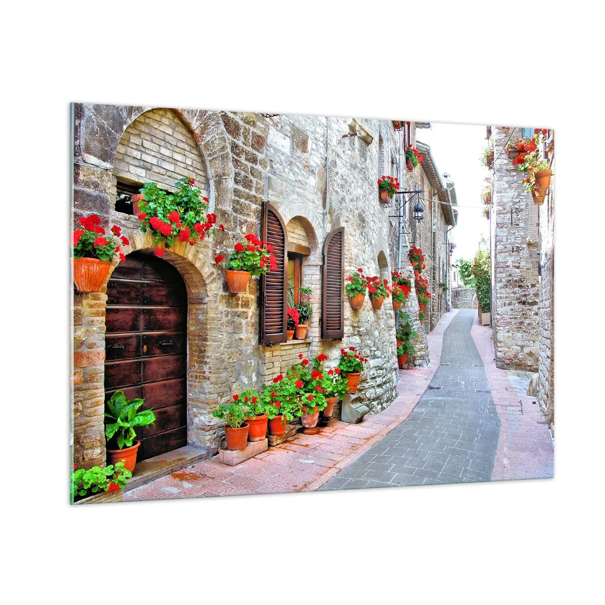 Quadro su vetro - Una pittoresca strada con muri in pietra e fiori rossi - 100x70cm - Atmosfera italiana - Decorazione murale moderna per soggiorno e camera da letto ARTTOR