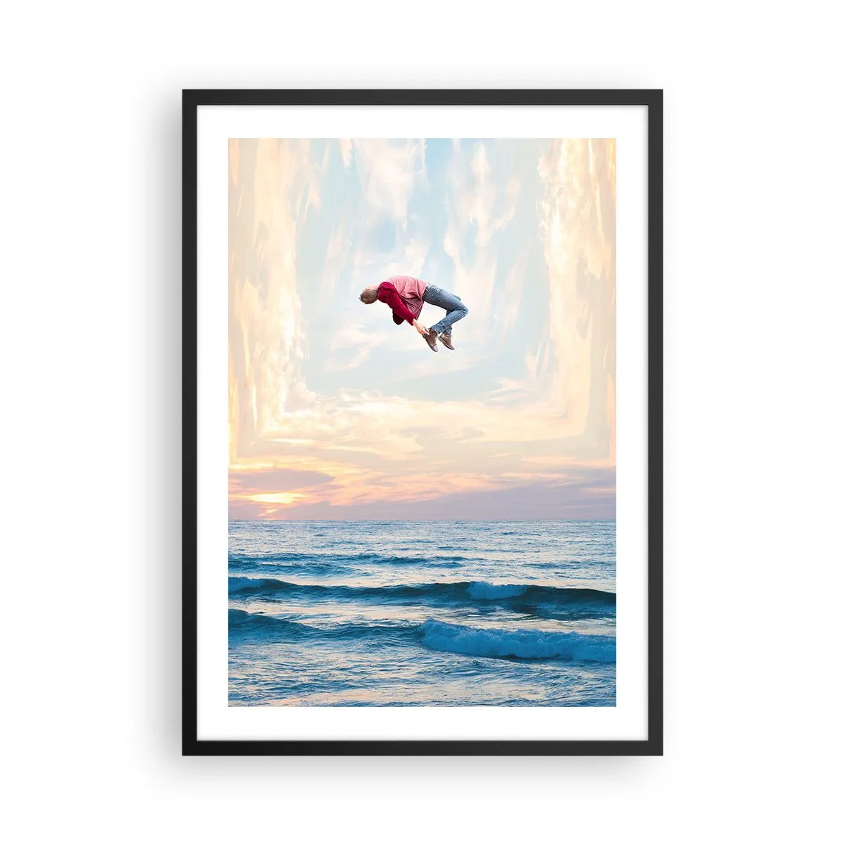 Poster in cornice nera - Un uomo salta nel cielo sopra l'oceano al tramonto - 50x70cm - In un'altra dimensione - Decorazione murale moderna per soggiorno e camera da letto ARTTOR