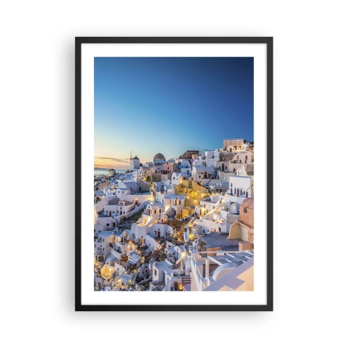 Poster in cornice nera - Vista delle case illuminate di Santorini al tramonto - 50x70cm - Essenza della grecità - Decorazione murale moderna per soggiorno e camera da letto ARTTOR