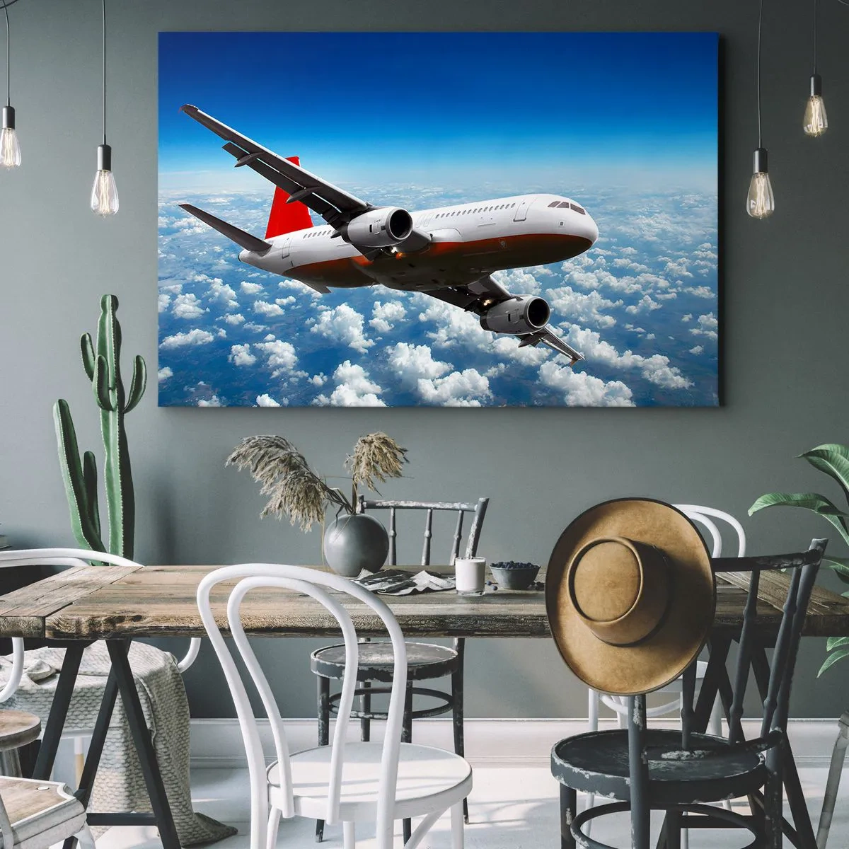 Quadro su tela - Stampe su Tela - Un aereo passeggeri vola sopra le nuvole contro un cielo azzurro. - 120x80cm - Lascia tutto - Decorazione murale moderna per soggiorno e camera da letto ARTTOR