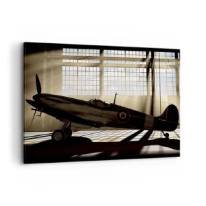 Quadro su tela - Stampe su Tela - Un aereo storico in un hangar illuminato dalla luce del sole - 100x70cm - Il riposo del guerriero - Decorazione murale moderna per soggiorno e camera da letto ARTTOR