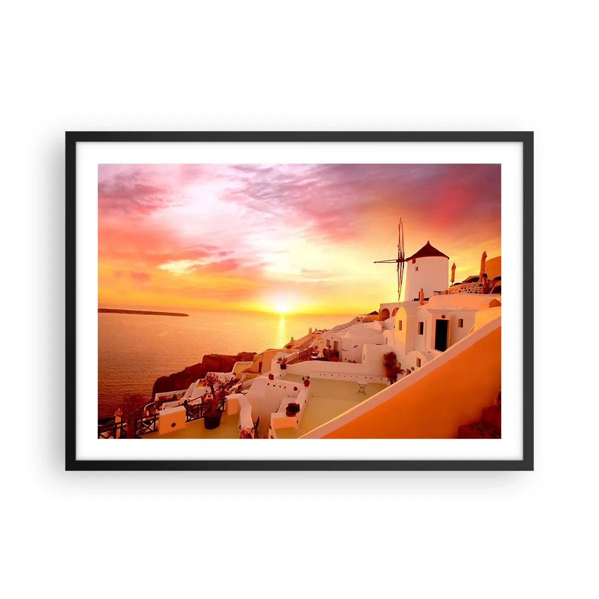 Poster in cornice nera - Santorini al tramonto con un mulino a vento - 70x50cm - Sciogliersi nel bianco e nell'oro - Decorazione murale moderna per soggiorno e camera da letto ARTTOR
