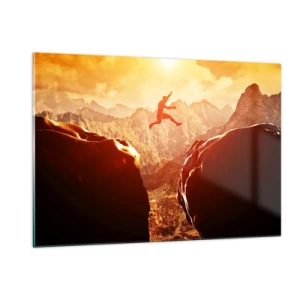 Quadro su vetro - Saltare un abisso in un paesaggio montano al tramonto - 120x80cm - Superare i confini - Decorazione murale moderna per soggiorno e camera da letto ARTTOR