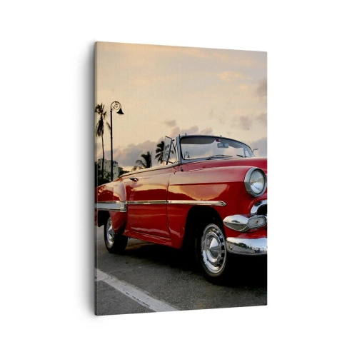 Quadro su tela - Stampe su Tela - Una decappottabile rossa classica parcheggiata tra le palme al tramonto. - 50x70cm - Il calore rosso dei tropici - Decorazione murale moderna per soggiorno e camera da letto ARTTOR