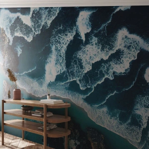 Fotomurali Premium Sand - Onde blu che si infrangono contro le rocce scure del mare - 100x70cm - Avvolte dalle onde - Decorazione murale moderna per soggiorno e camera da letto ARTTOR