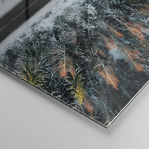 Quadro su vetro - Tagliando la foresta invernale - 120x50 cm